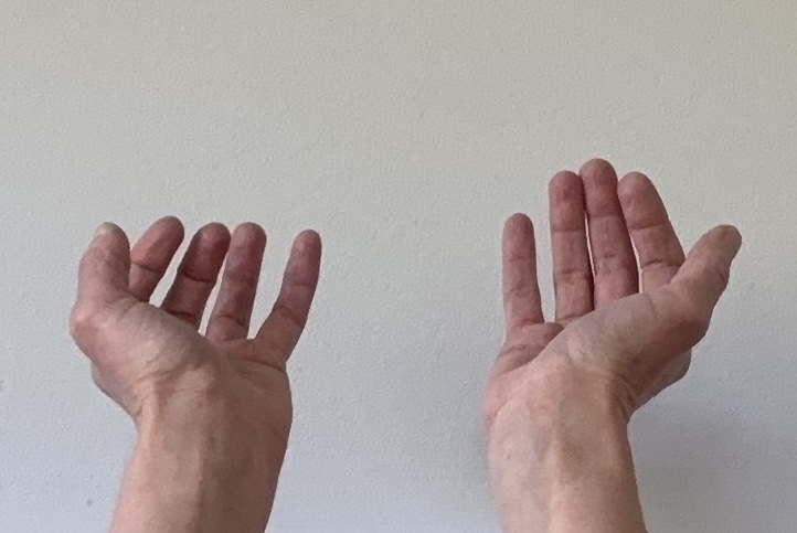 picture of hands stretched out by Jewels